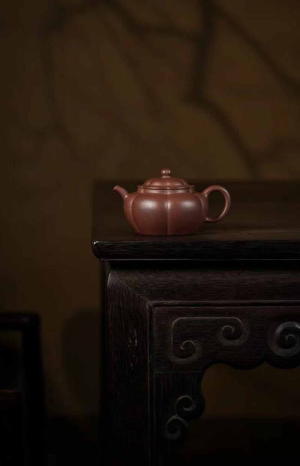 authentic purple clay Yixing zisha teapot on chinese style table
